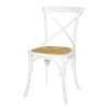 Rattan und weißer Bistrostuhl